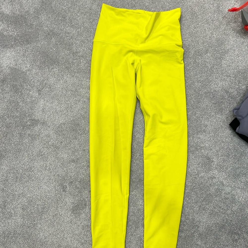 Neon yellow workout leggings. Size small.